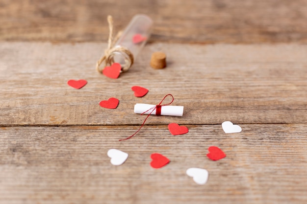 Free Photo high angle of hearts and tube for valentines day