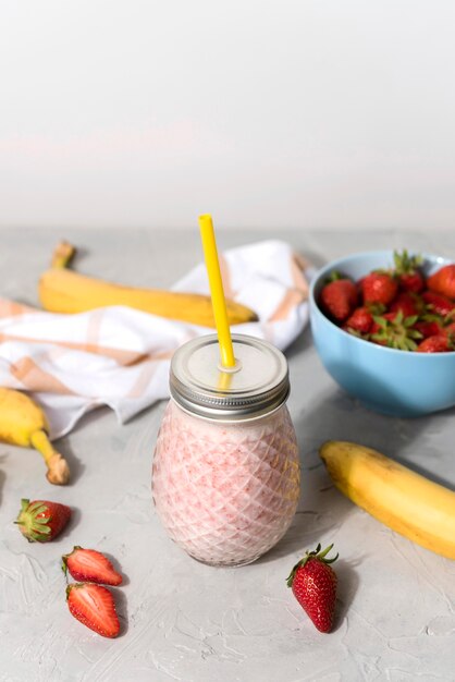 High angle jar with strawberry smoothie