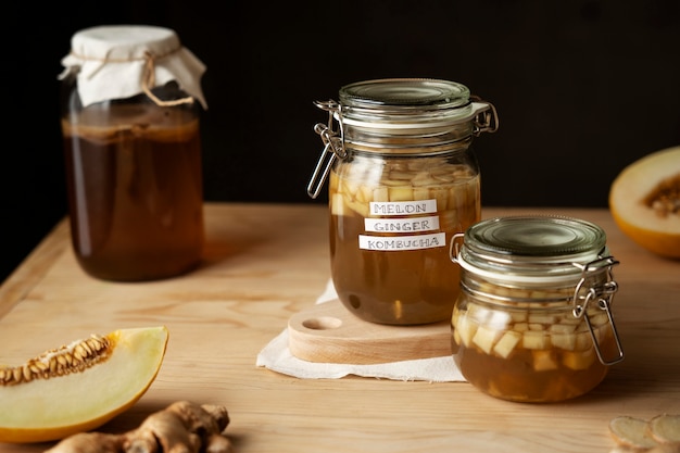 Free photo high angle jars with delicious kombucha