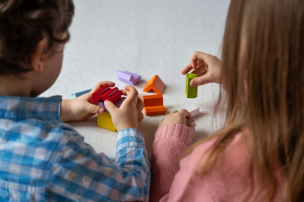 Free Photo high angle kids playing memory game