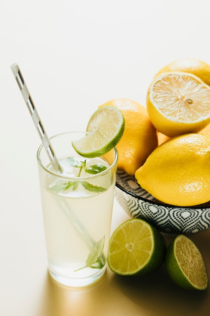 High angle on lemon bowl on plain background