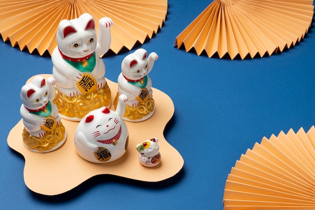 Free photo high angle lucky cats arrangement