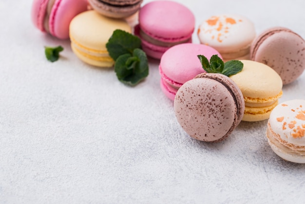 High angle of macarons with mint