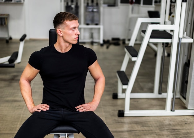 High angle male at gym on break