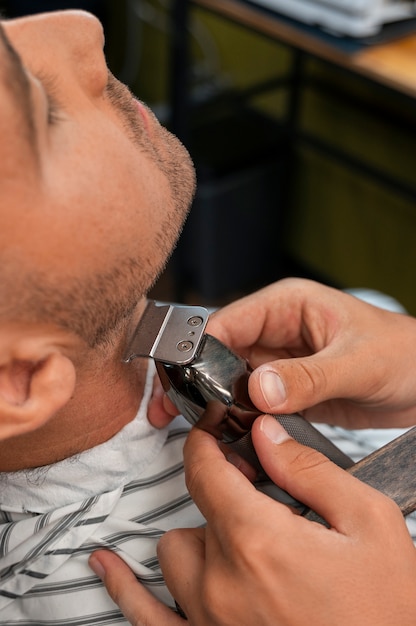 High angle man getting groomed