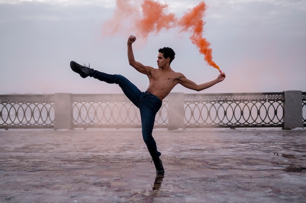 High angle man performing ballet outdoor