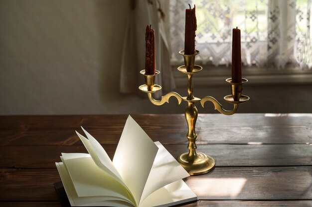 High angle menorah and book on wooden table