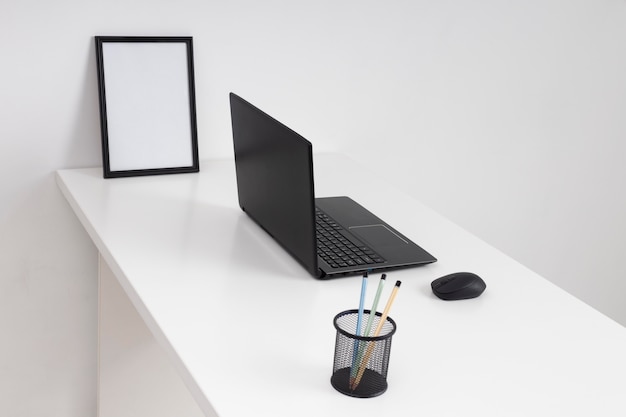 Free photo high angle minimalist business desk arrangement