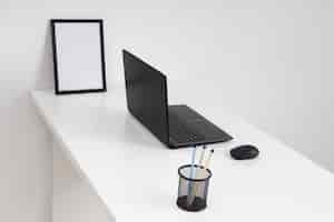 Free photo high angle minimalist business desk arrangement