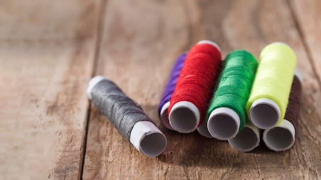 High angle of multicolored thread reels