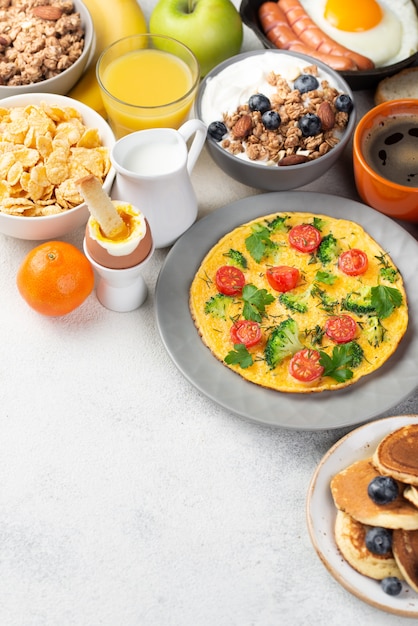 Free Photo high angle of omelette with cereal and pancakes for breakfast