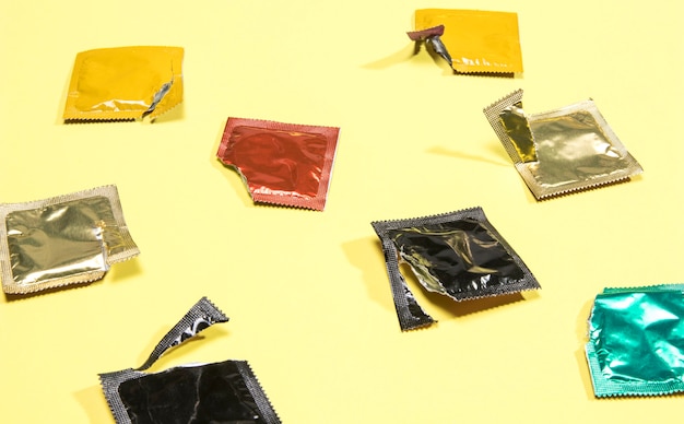 High angle opened condoms wrappers