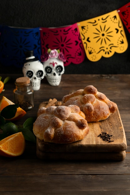 High angle of pan de muerto with skulls