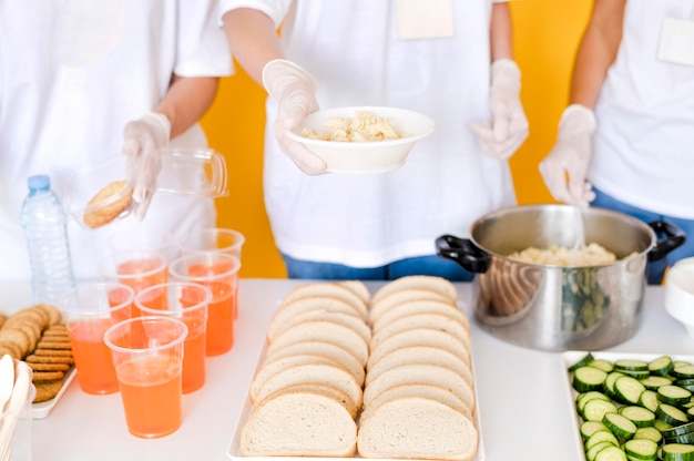 Free Photo high angle of people preparing food for donation