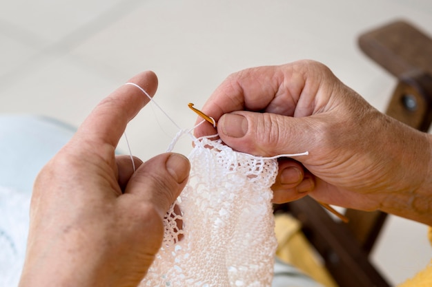 Free Photo high angle of person crocheting