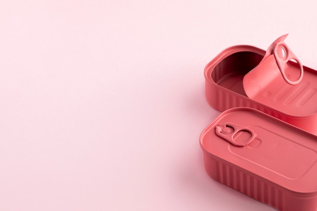 High angle pink tin cans with copy-space