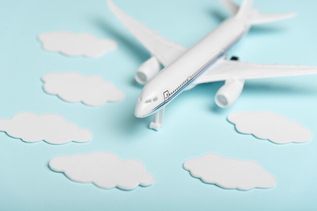 High angle plane toy on blue background