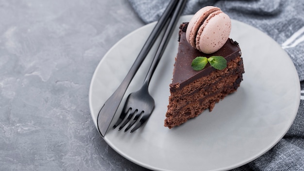 Free photo high angle of plate with cake and cutlery