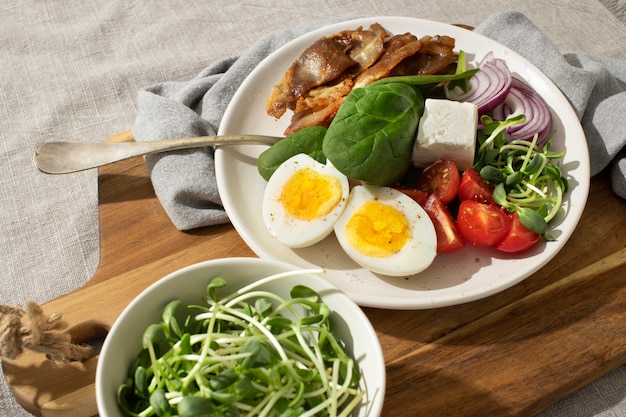 Free Photo high angle of plate with keto diet food and a bowl with sprouts