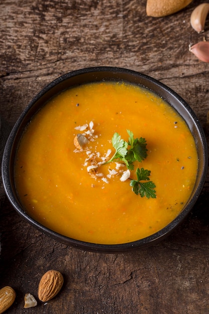 Free photo high angle pumpkin cream soup in bowl