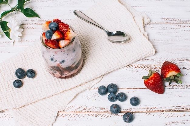 Free Photo high angle refreshing strawberry and blueberry smoothie