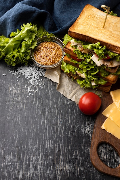 High angle of salad sandwich with tomato and copy space