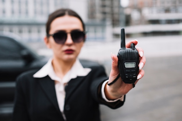 Free photo high angle security woman with equipment