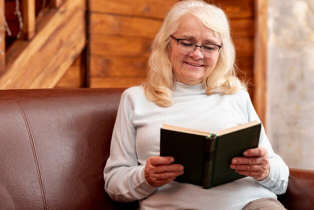 High angle senior female reading