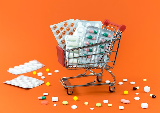 High angle of shopping cart with pill foils