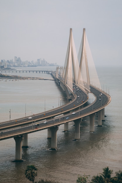 Free photo high angle shot of bandra worli sealink in mumbai enveloped with fog