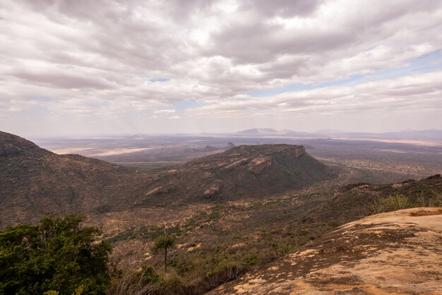 High angle shot of the beautiful hills under the cloudy sky captured in Kenya, Nairobi, Samburu