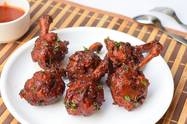 High angle shot of delicious hot and spicy dish called Drums of heaven on the table