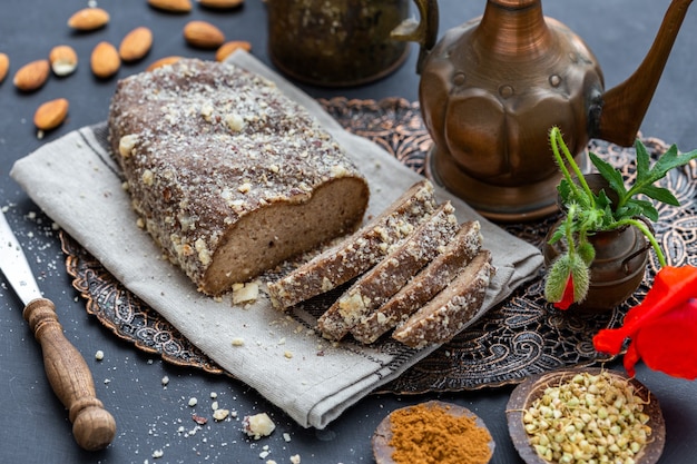 High angle shot of fresh raw vegan bread on a rustic table