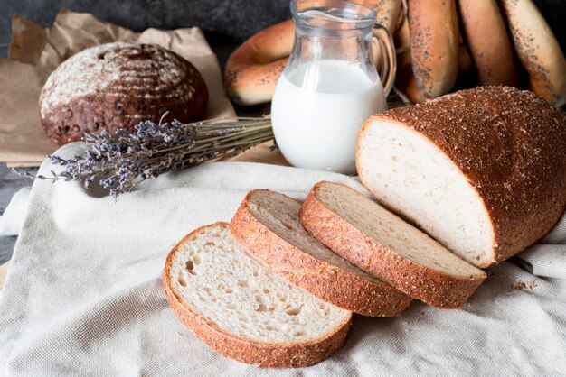 High angle sliced bread with milk