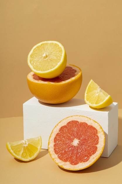 Free Photo high angle of a sliced orange and a grapefruit