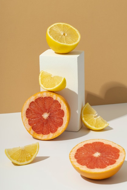 Free Photo high angle of a sliced orange and a grapefruit