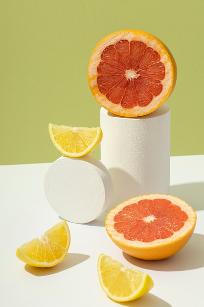 Free Photo high angle of a sliced orange and a grapefruit