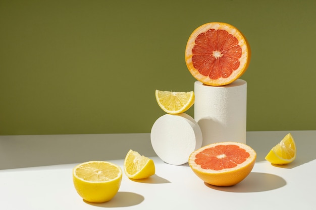 High angle of a sliced orange and a grapefruit