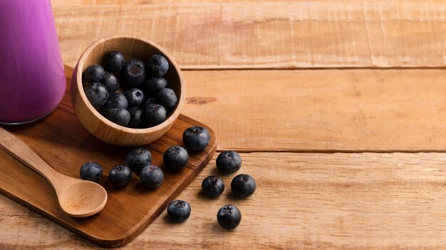 High angle smoothie and blueberries