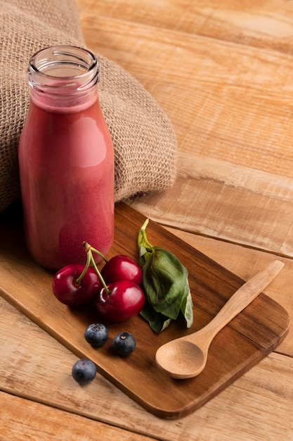 Free Photo high angle smoothie with cherries and blueberries