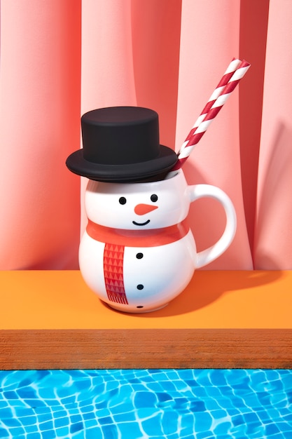 High angle snowman mug at pool