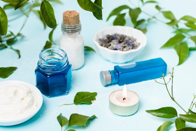 High angle spa composition with lit candle