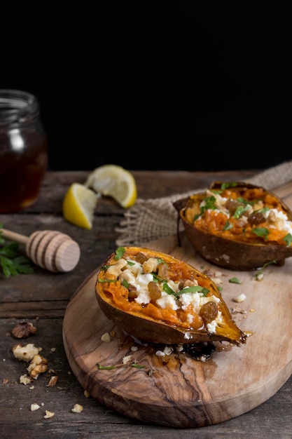 High angle sweet potatoes on wooden board