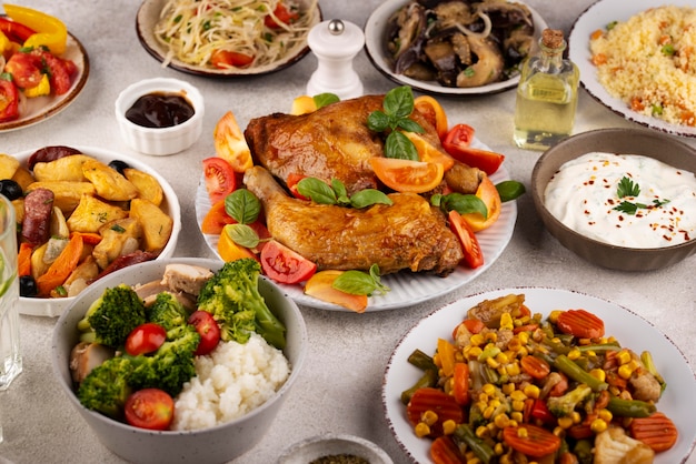 High angle table full of delicious food arrangement