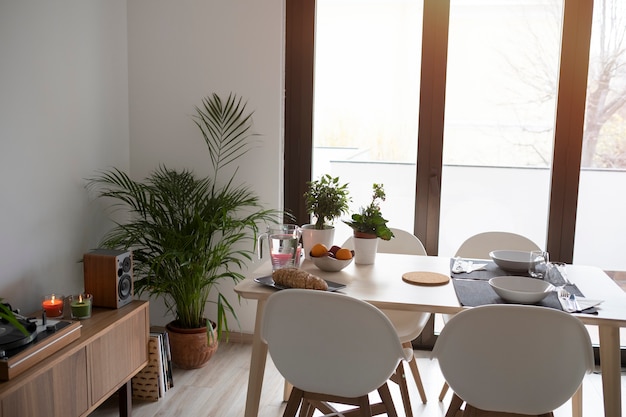 Free Photo high angle table with cutlery and plates arrangement