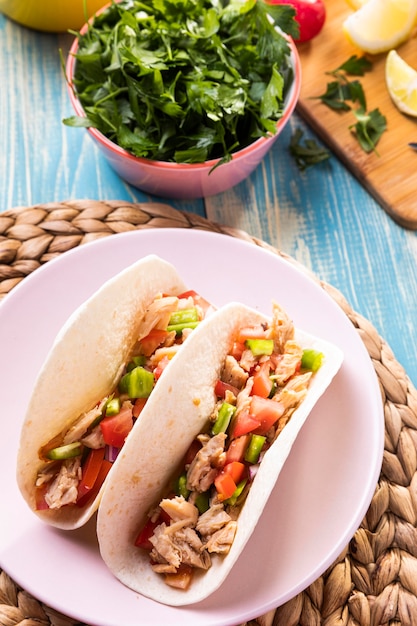 High angle tacos with meat on plate