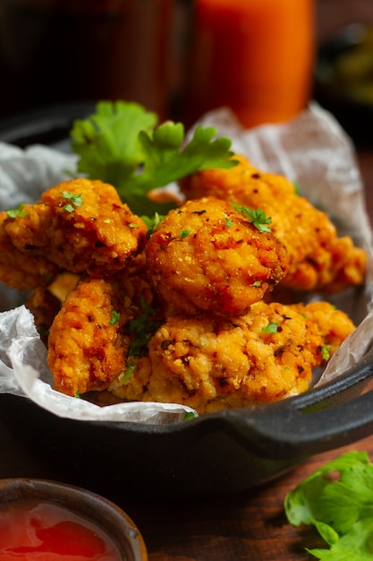 Free photo high angle tasty boneless chicken with parsley