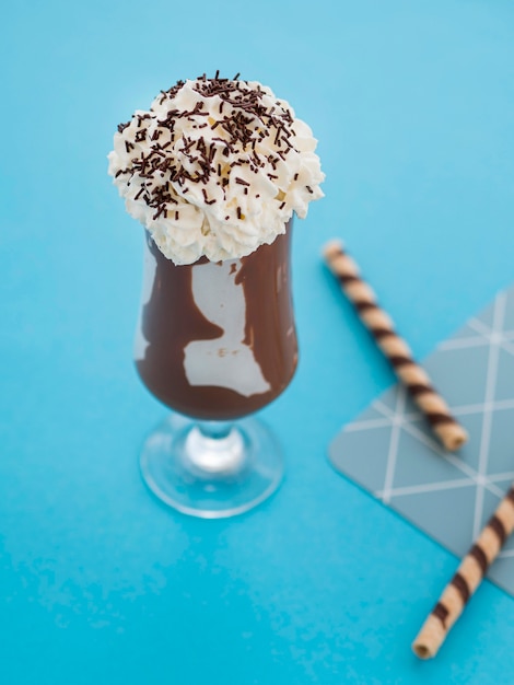 Free photo high angle tasty chocolate milkshake