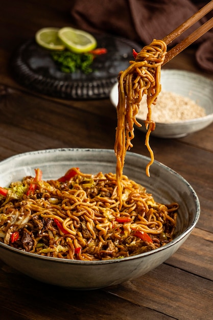 Free photo high angle tasty composition of noodles on a table