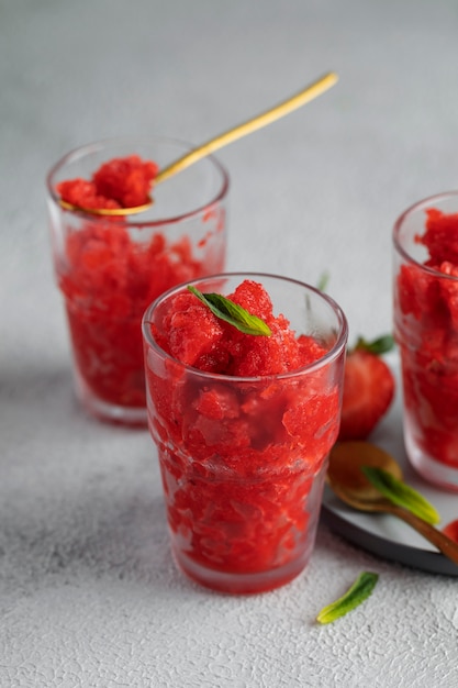 High angle tasty granita dessert with strawberries